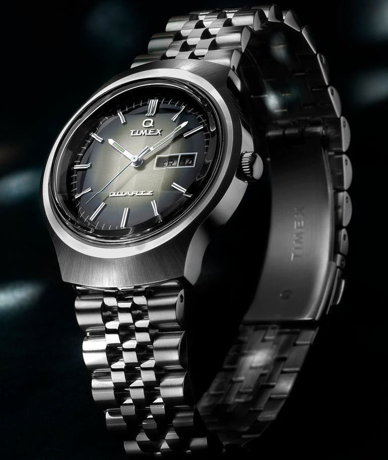 Step into a world of smoky grandeur with our Q Timex Reissue Dégradé