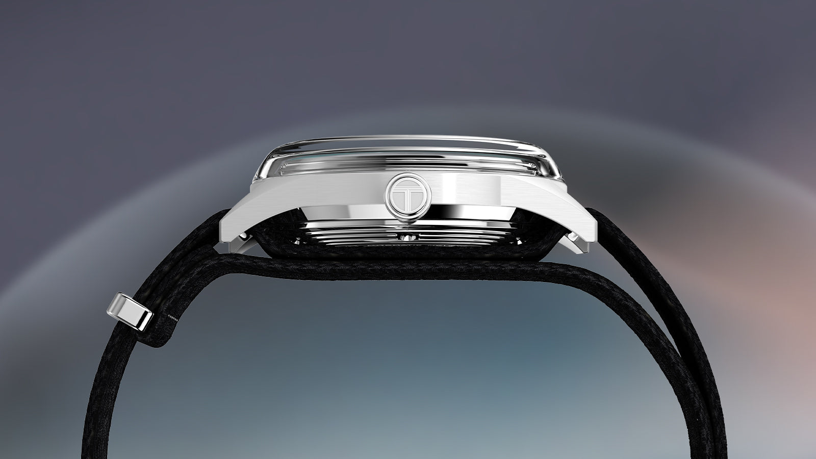 Side profile of the Timex Marlin Jet Automatic showing the polished stainless-steel case, crown, and black fabric strap.