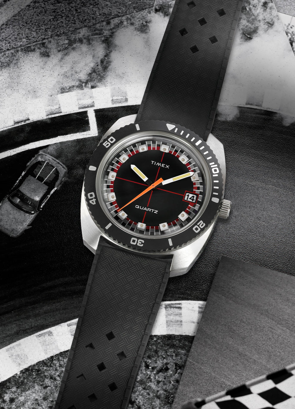 angled view of the Q Timex Reissue amongst a black and white background