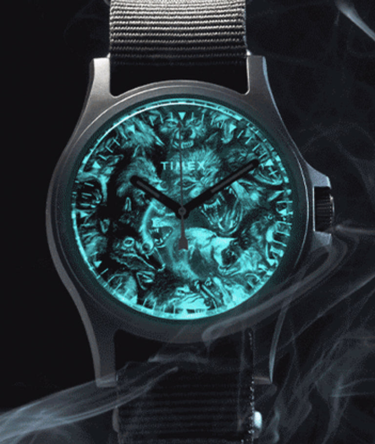 Up close of watch with smoke in the forefront
