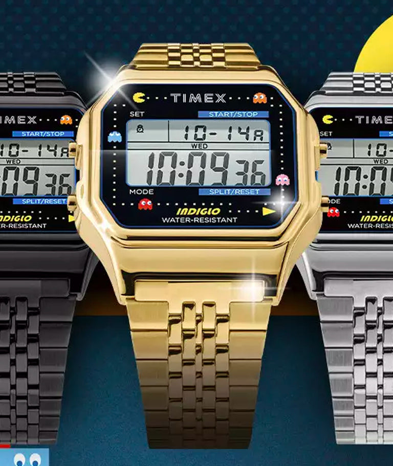 Three digital watches showing Pac-Man characters on dial