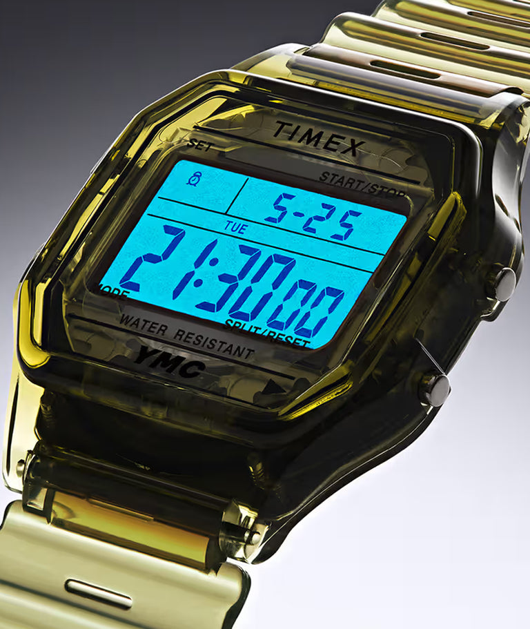 Up close of digital watch with the indiglo dial activated
