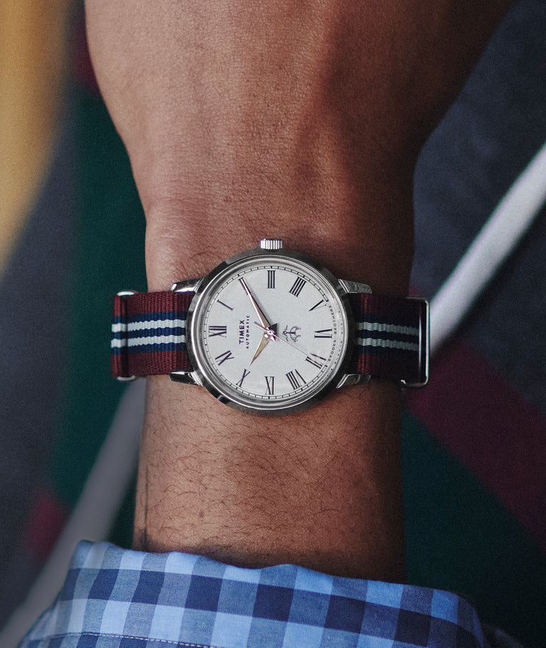 Watch shown horizontally on a man's wrist
