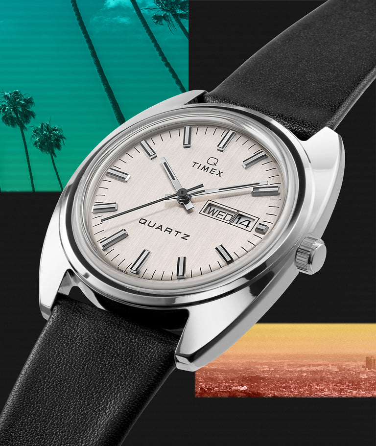 Timex reissue with a palm tree and city shown in the background