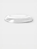 Clear plastic dome lid on a white background