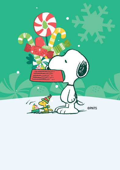Illustration of Snoopy carrying a large red gift box filled with candy canes and presents, while Woodstock walks beside him in a festive hat. Background features green snowflakes and candy patterns.
