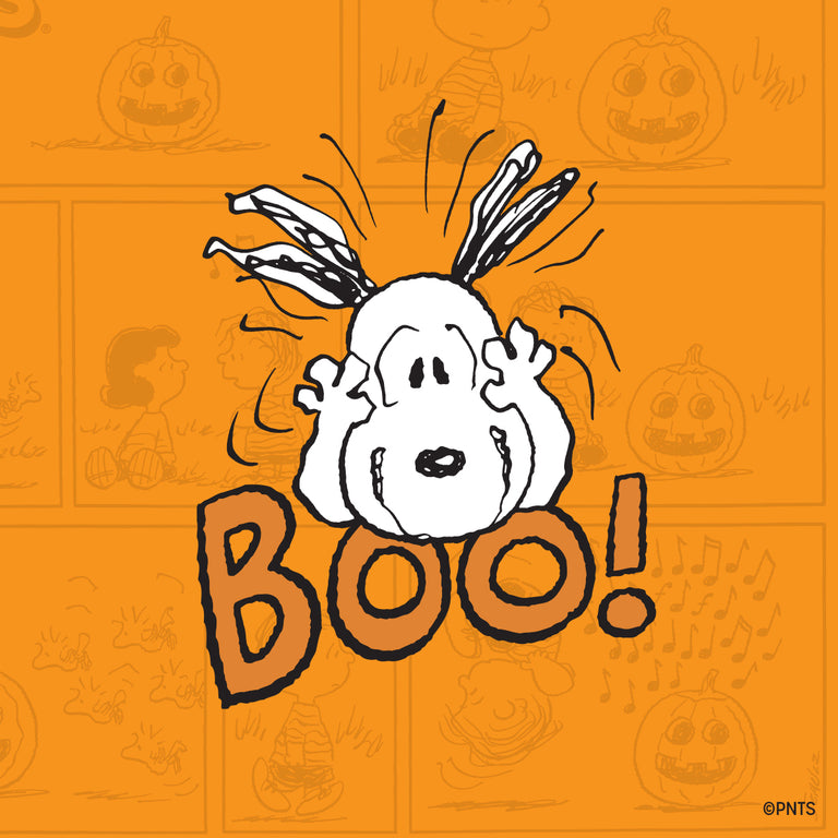 TW2Y12300 Snoopy with raised paws and ears above “BOO!” text on an orange background patterned with Peanuts comic panels and jack-o’-lanterns.