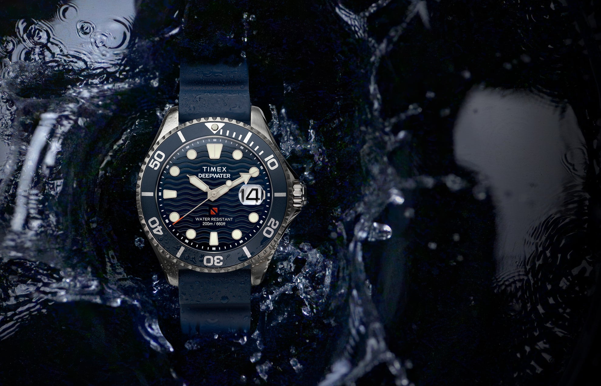 Timex Deepwater Meridian 200 dive watch with blue strap and wavy blue dial surrounded by splashing water, emphasizing its rugged 200-meter water resistance.