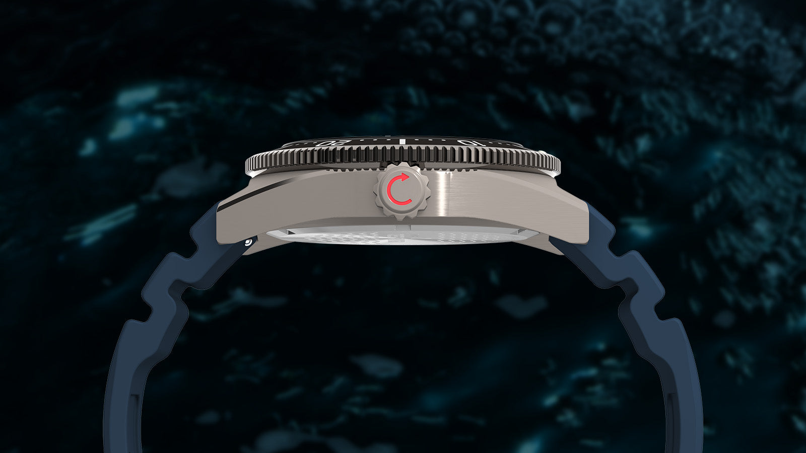 Side profile of the Timex Deepwater Reef 200 GMT showing its brushed steel case, engraved crown with red arrow symbol, and durable blue silicone strap.