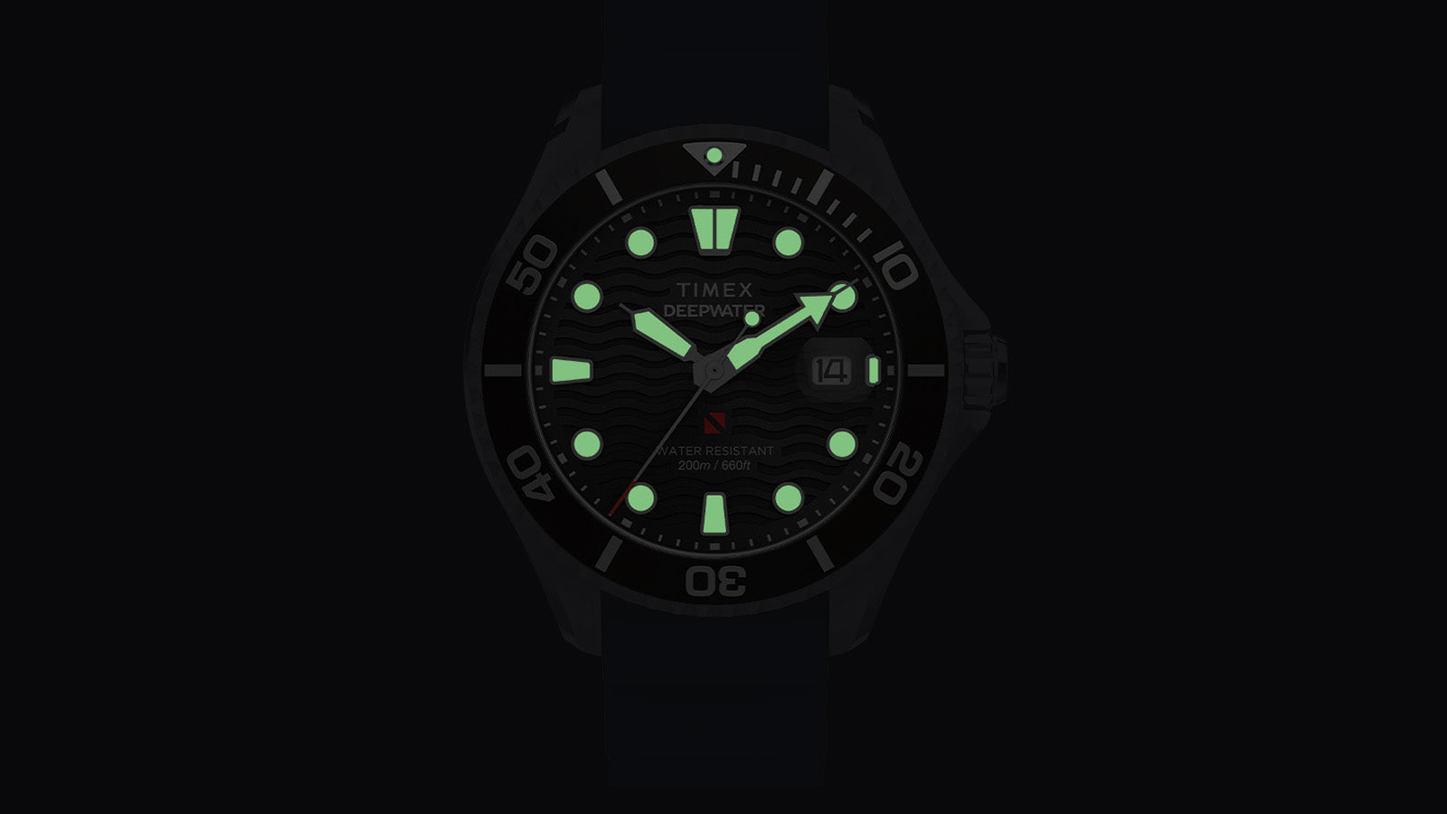 Luminous view of the Timex Deepwater Meridian 200 dial glowing in green against the dark, highlighting the visibility of hands and hour markers for underwater readability.