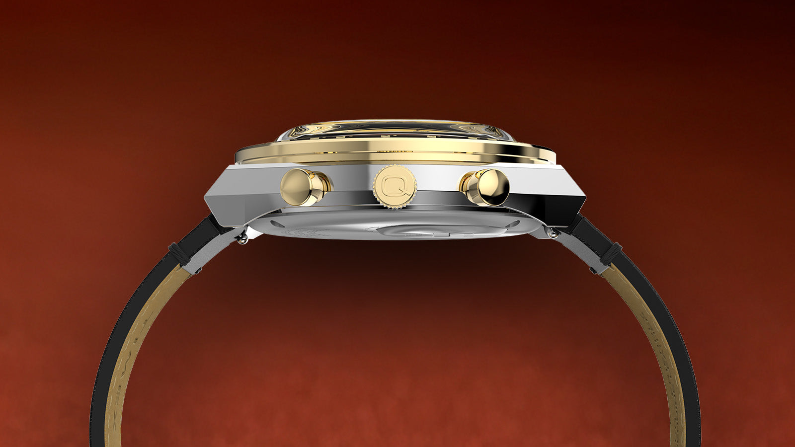 Side profile view of the Q Timex Chronograph highlighting its brushed and polished stainless steel case, gold-tone pushers, and signed crown.