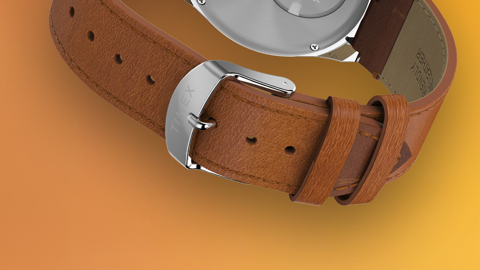 Detailed view of the tan leather strap and polished stainless-steel buckle engraved with the Timex logo.