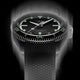 Front view of the Timex Atelier automatic dive watch with black dial, luminous indices, and black textured rubber strap, designed for mobile display.