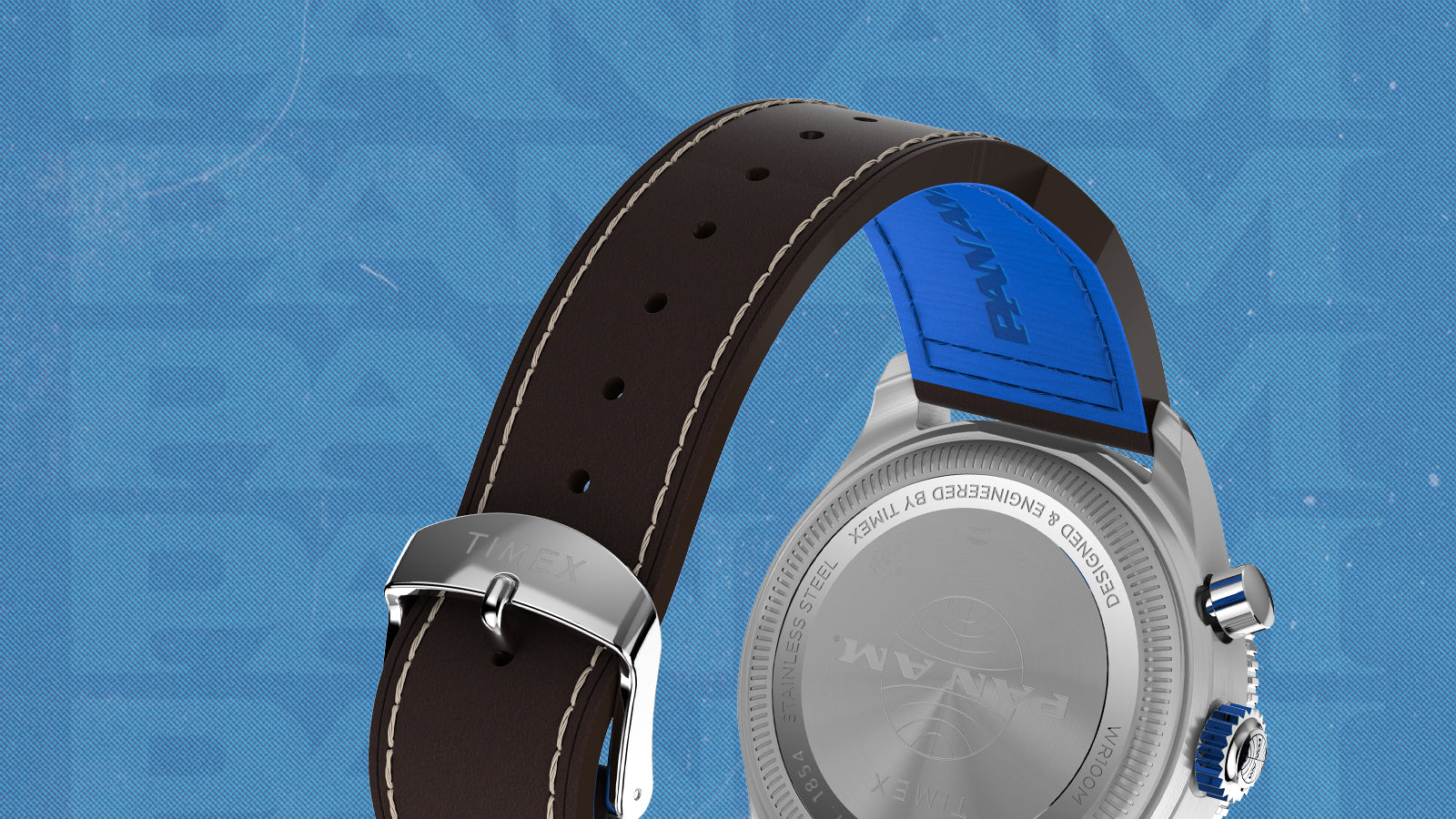 Rear view of the Timex x Pan Am® Fly-Back Chronograph showing the engraved Pan Am logo on the stainless-steel case back and the brown leather strap with blue Pan Am-branded lining. The polished buckle is engraved with the Timex logo.