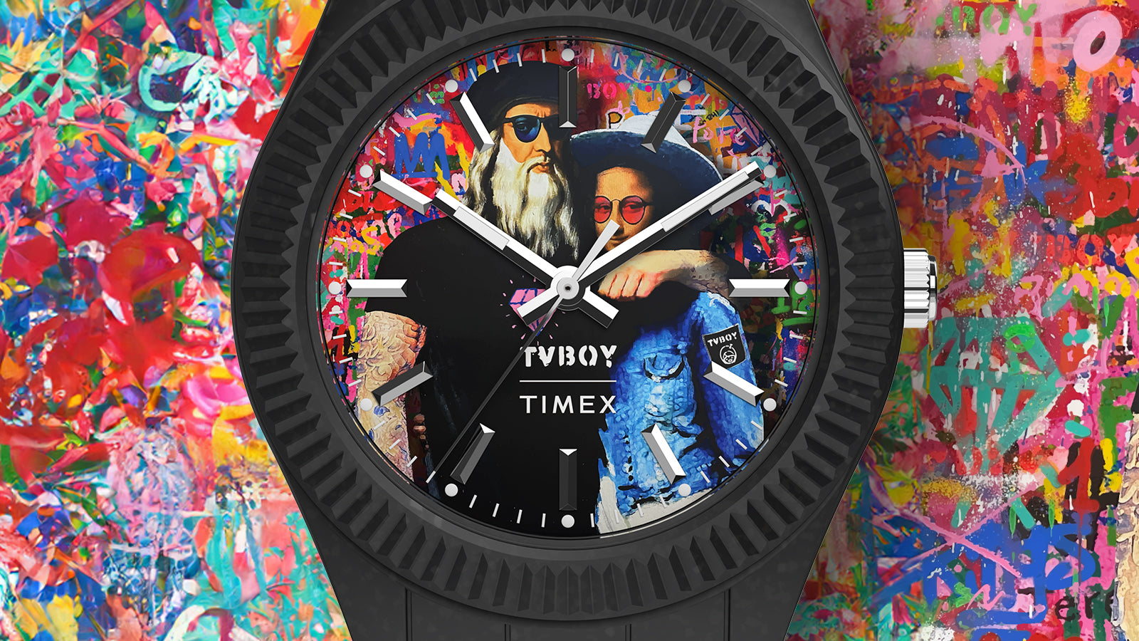 Detailed macro shot of the Timex Legacy Ocean x TVBOY watch face showing the art design by TVBOY featuring two contemporary figures over a graffiti-inspired backdrop. The image emphasizes Timex and TVBOY branding on the dial.