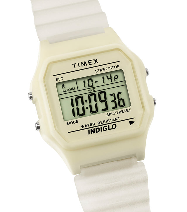 Angled view of the TIMEX® T80 digital watch with cream-colored resin case and strap, displayed against a clean white background.