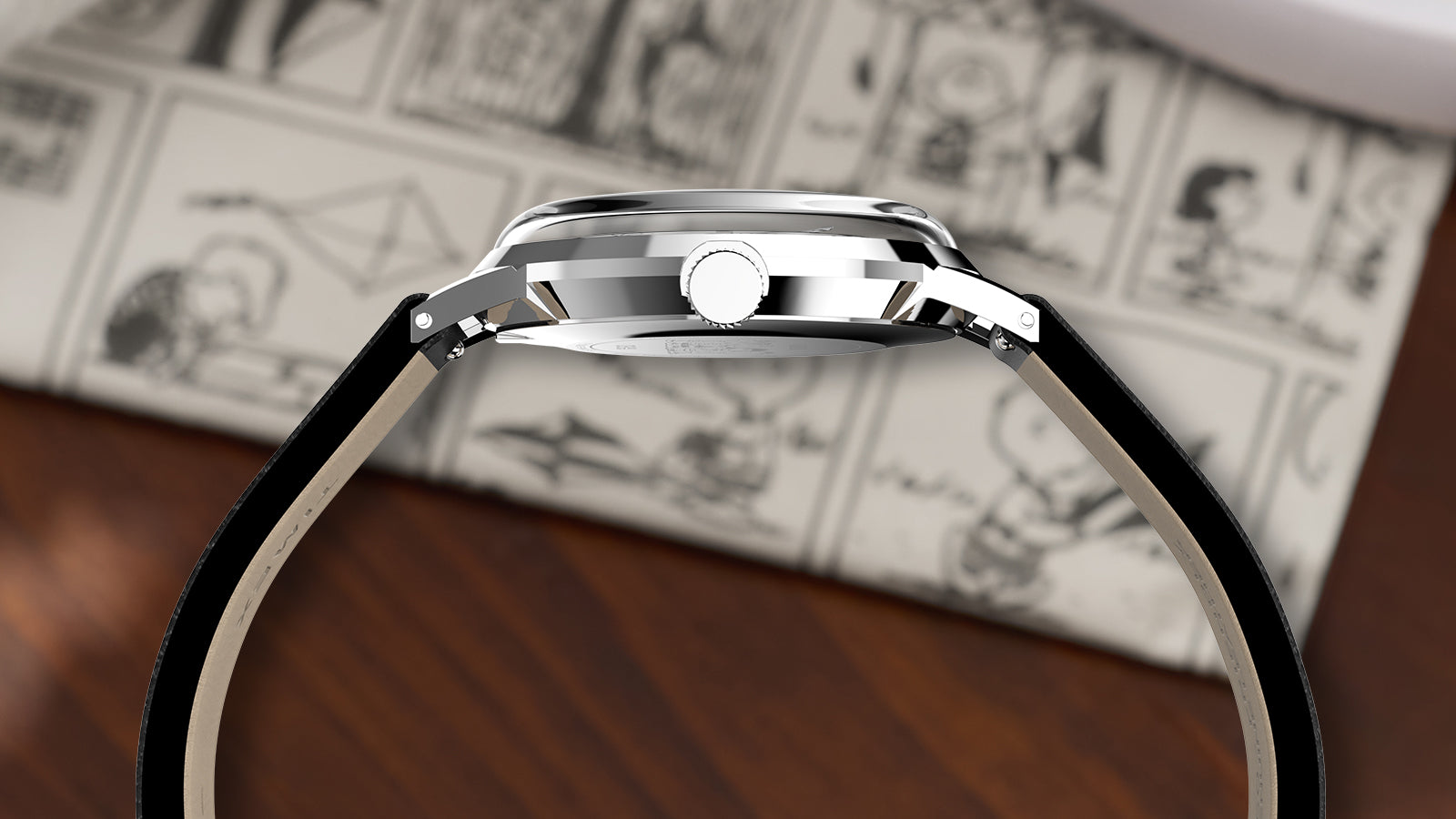 Side profile of Peanuts® x Timex Marlin® Pickleball Marlin® watch showing slim stainless-steel case and domed crystal.