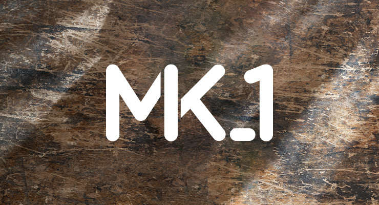 White text reading “MK.1” centered on a rustic, weathered wooden background.