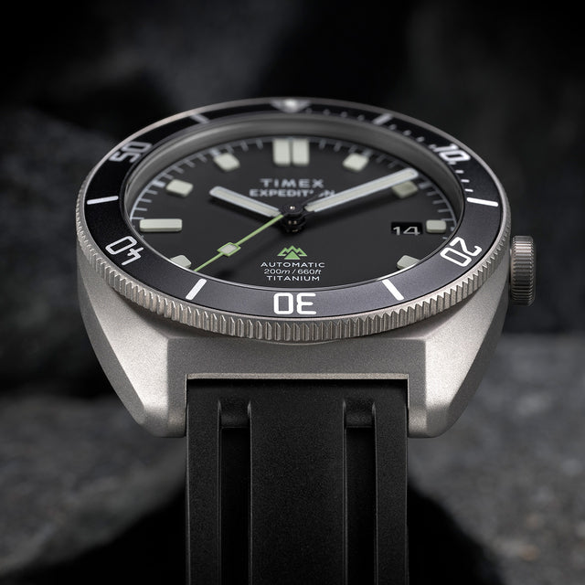Close-up of Timex Expedition Pioneer Titanium Automatic dial showing date window and rotating bezel