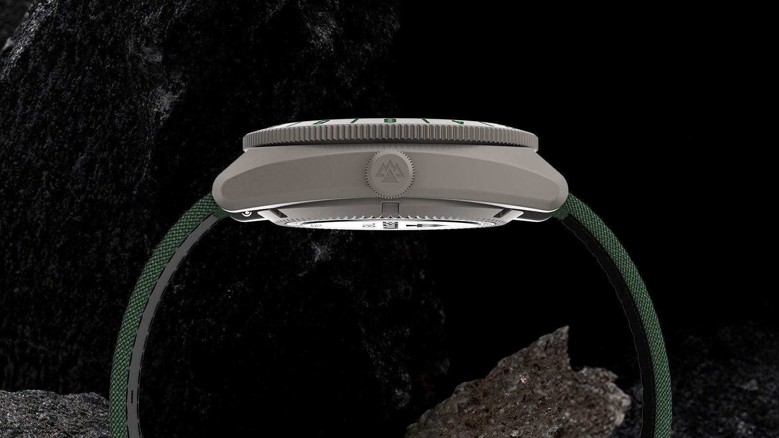 Side profile of titanium case and crown design on Timex Expedition Pioneer Automatic GMT watch.