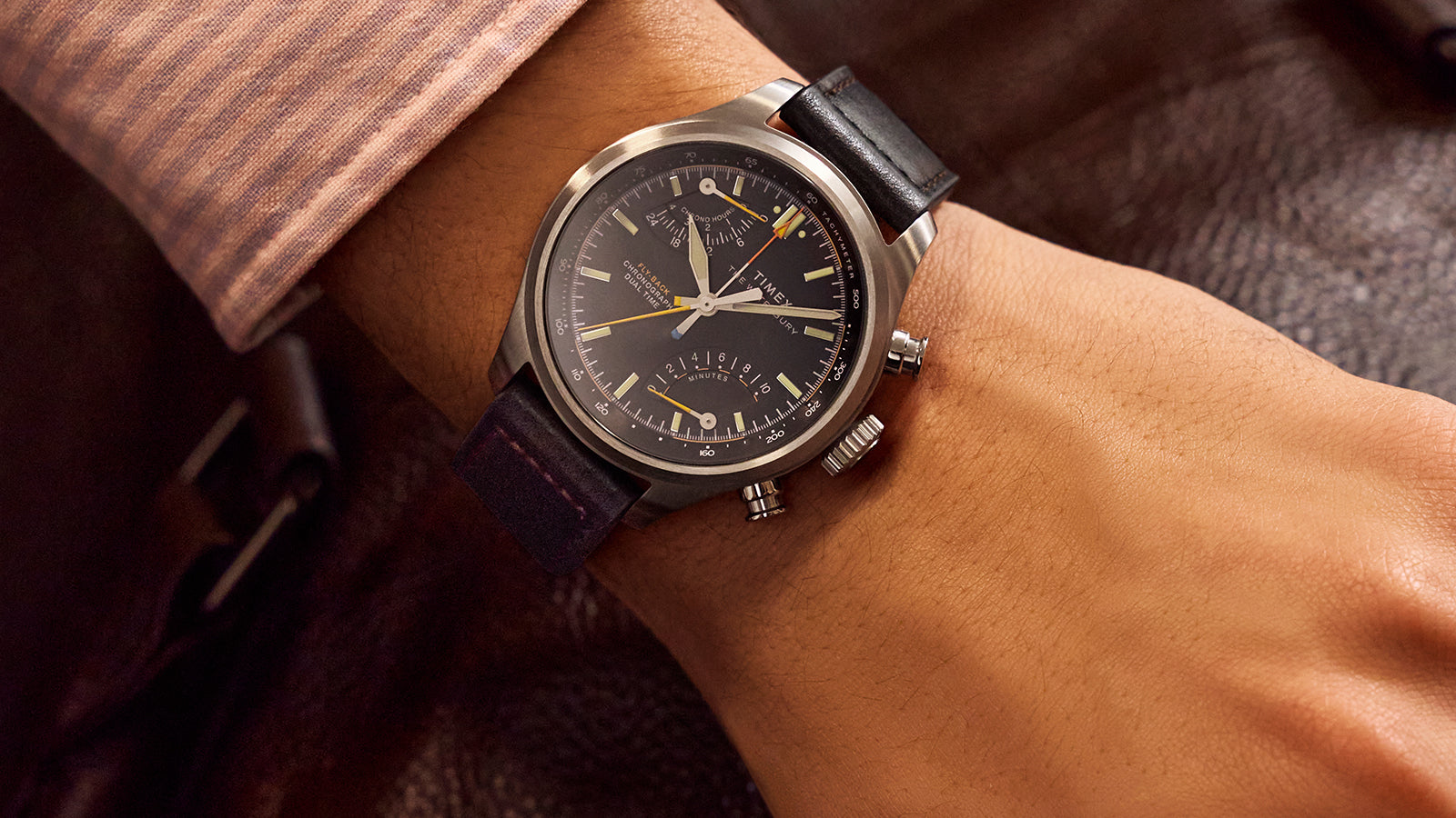 Angled view of Timex Waterbury Ace Fly-Back Chronograph on wrist highlighting dual time subdial and chronograph pushers