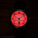 Harry Potter x Timex Weekender Gryffindor House watch illuminated in red INDIGLO night-light mode.