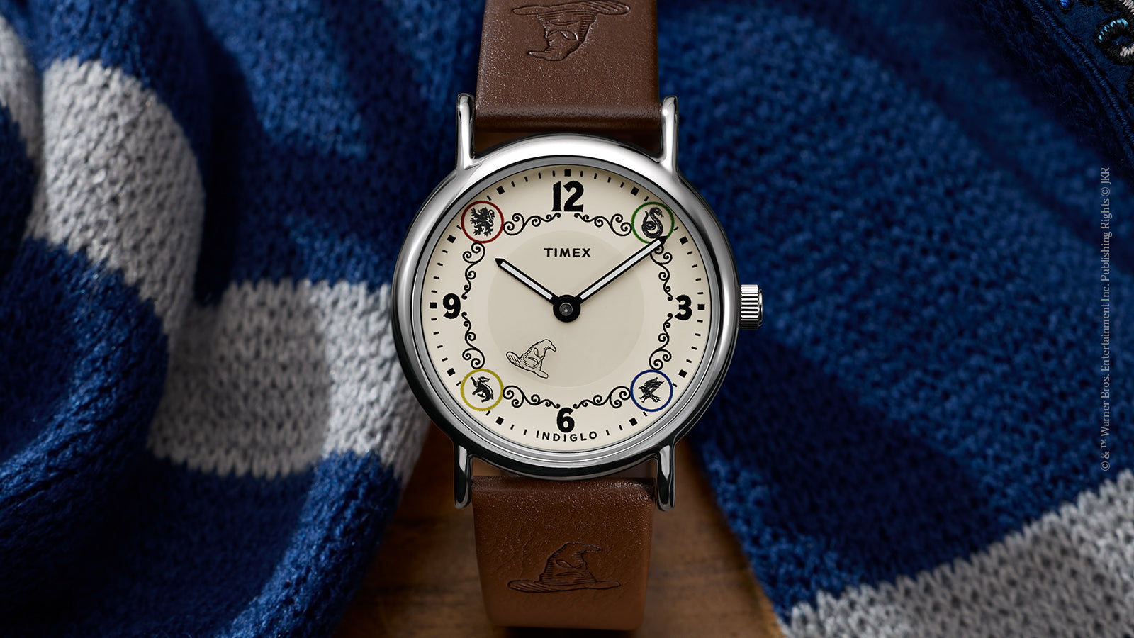 Front view of Harry Potter x Timex Weekender Ravenclaw watch with silver-tone case and house-themed dial.