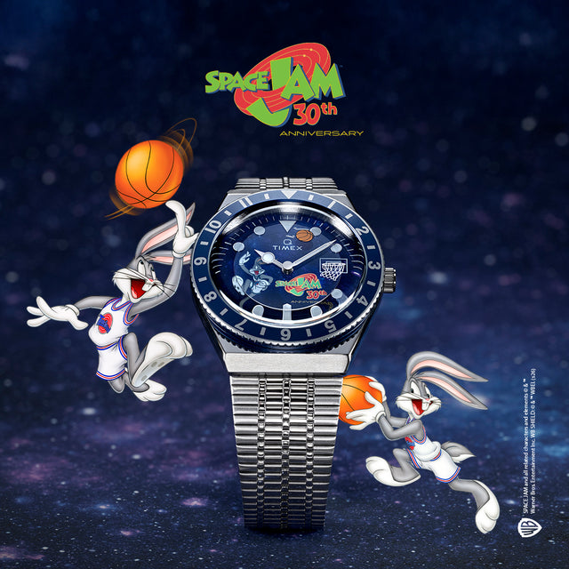 Space Jam x Timex Q 30th Anniversary watch front view featuring blue bezel, Bugs Bunny graphic dial, and stainless steel bracelet