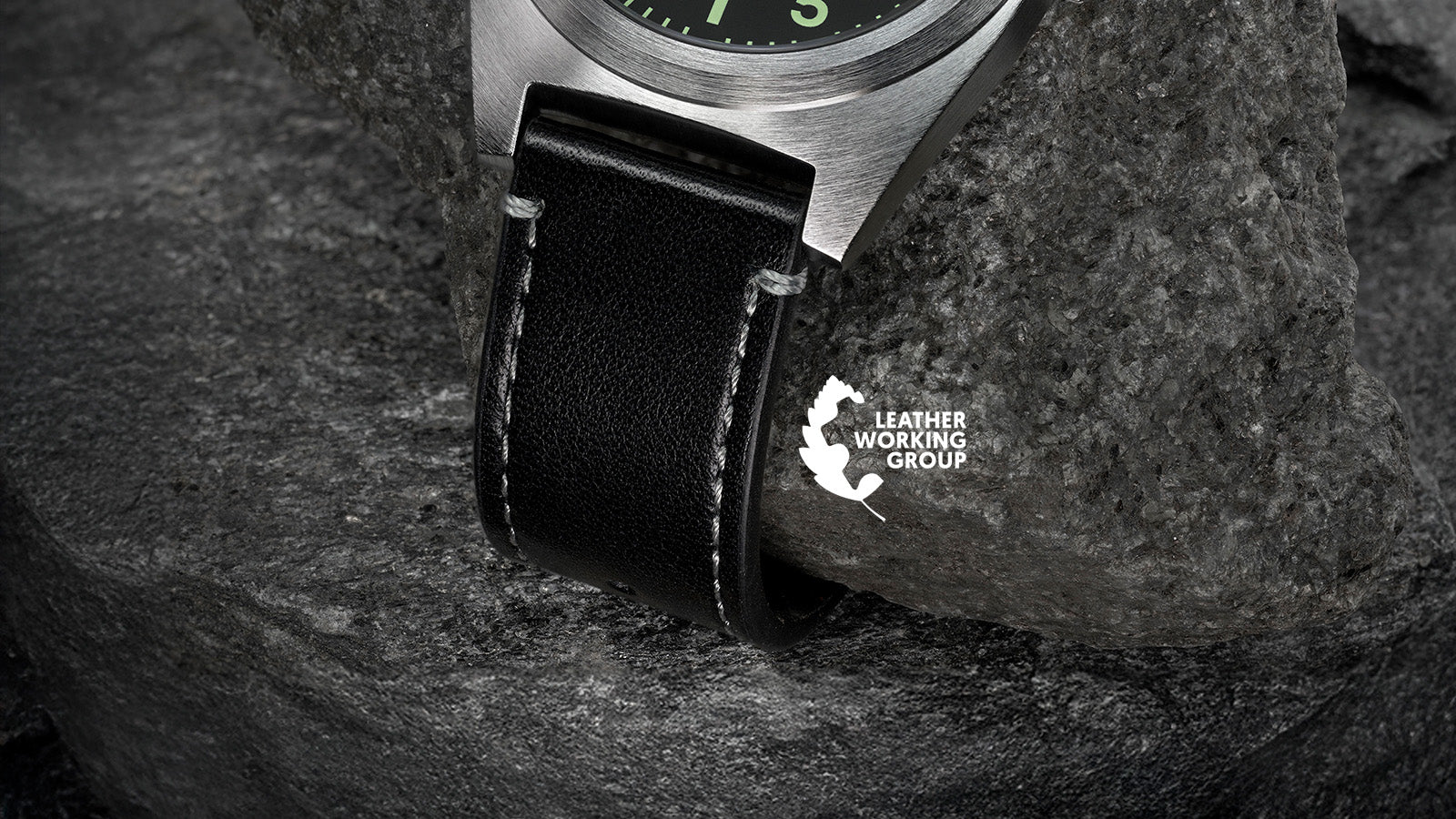 Timex Expedition Capstone black leather strap detail with stitching and Leather Working Group certification