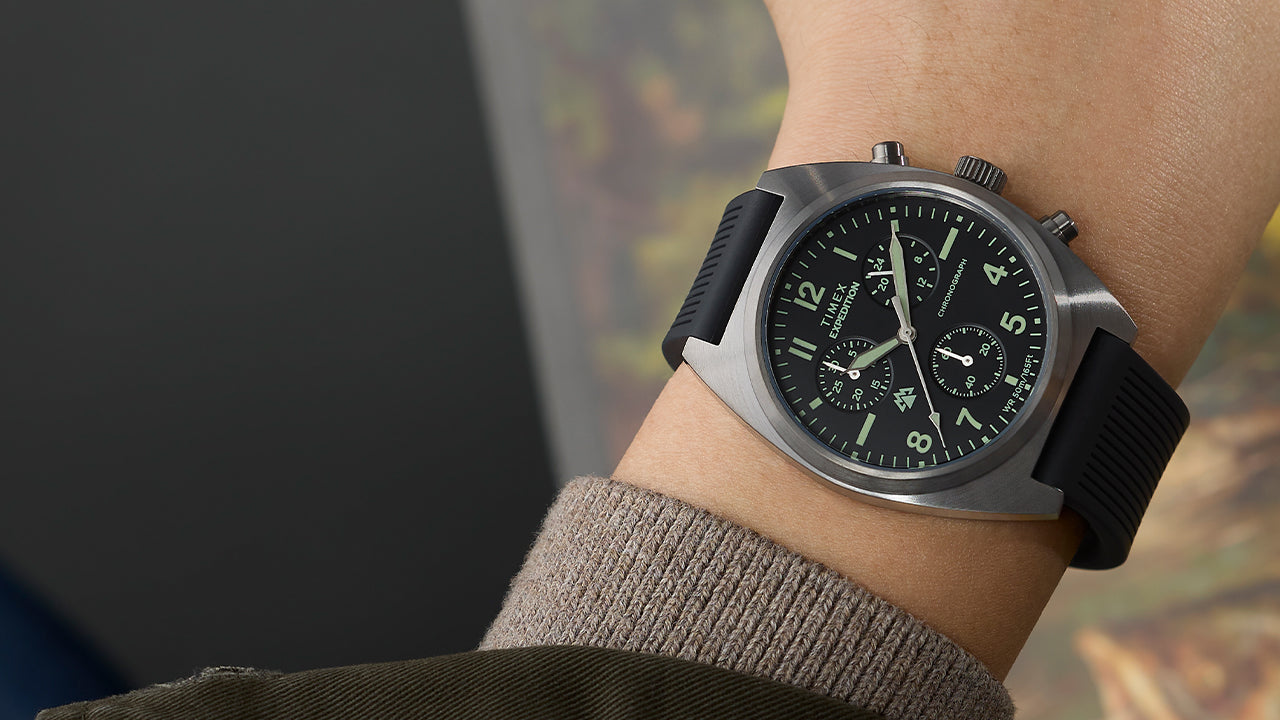Timex Expedition Capstone Chronograph watch on wrist with black dial and black rubber strap