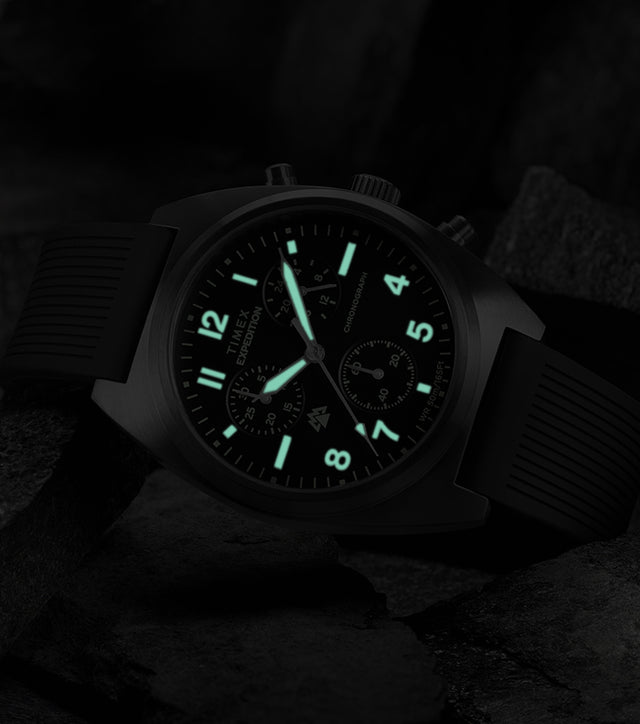 Timex Expedition Capstone Chronograph with glowing lume markers and hands in low light