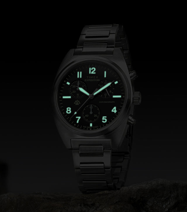 Timex Expedition Capstone Chronograph with glowing lume markers and hands in low light