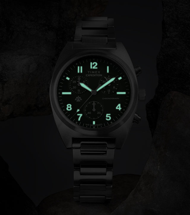 Timex Expedition Capstone Chronograph with glowing lume markers and hands in low light