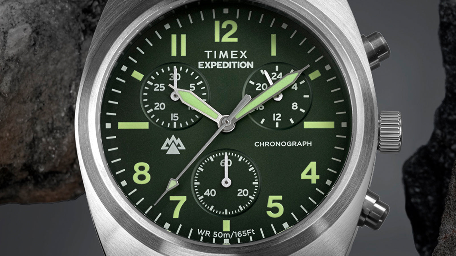 Close-up of Timex Expedition Capstone Chronograph green dial with subdials and luminous markers