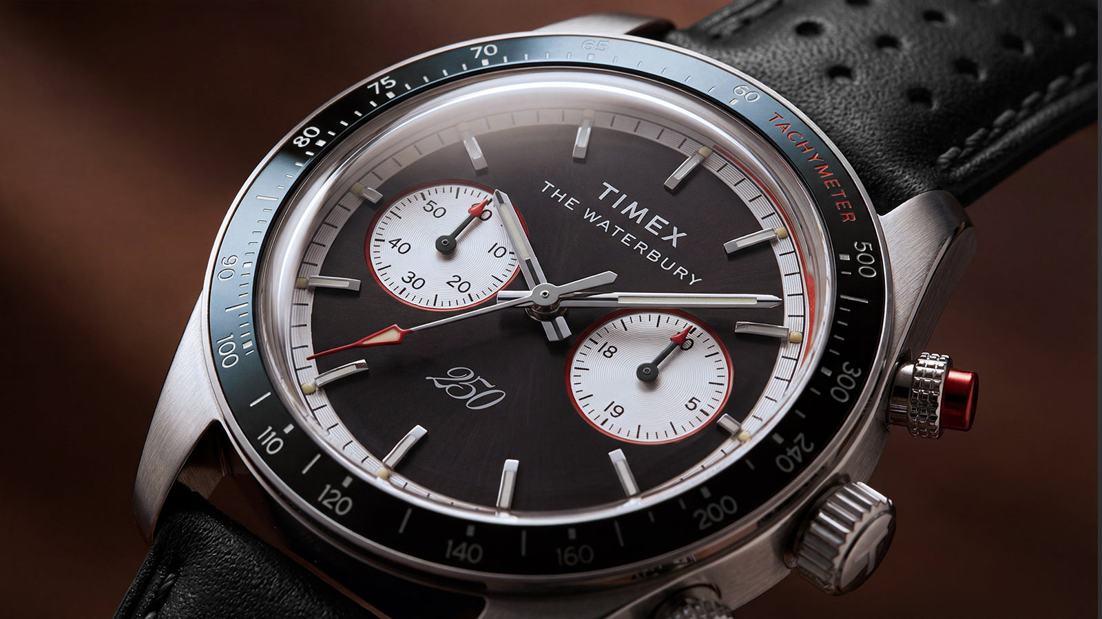 Close-up of the Waterbury Heritage America 250 Chronograph dial highlighting the tachymeter bezel, chronograph subdials, and America 250 commemorative marking.