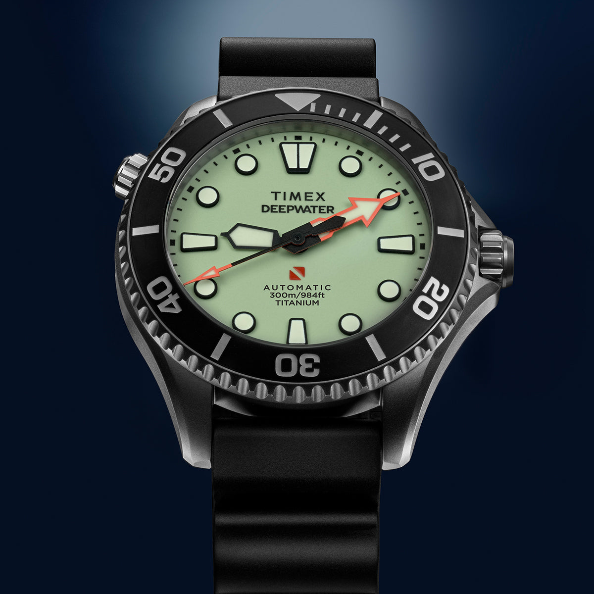 Front view of the Timex Deepwater Meridian 300 Titanium HEV Automatic showcasing its luminous dial, titanium case, and black rubber strap.