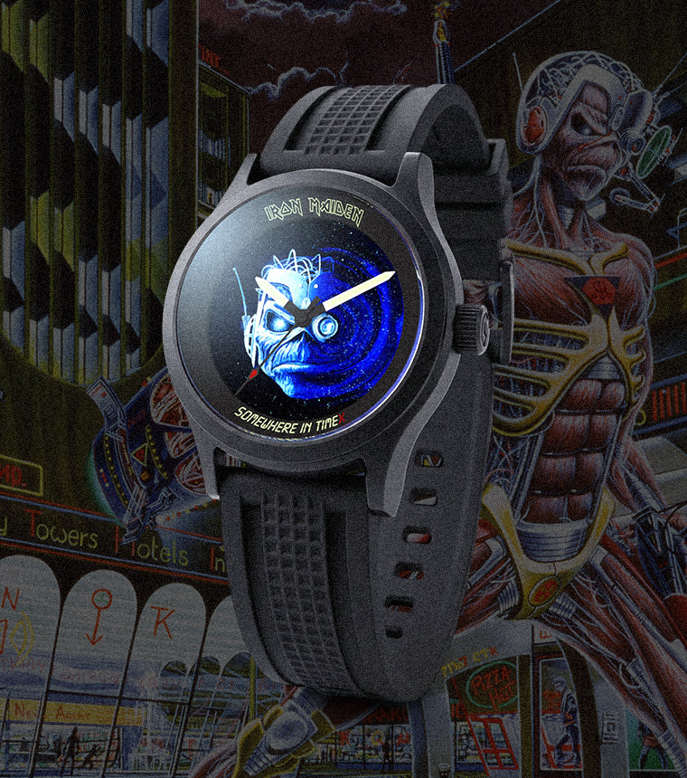 Timex x Iron Maiden 1986 Tribute watch floating in a cyberpunk cityscape inspired by “Somewhere in Time,” featuring Eddie in the background and a glowing blue galaxy-style dial graphic.