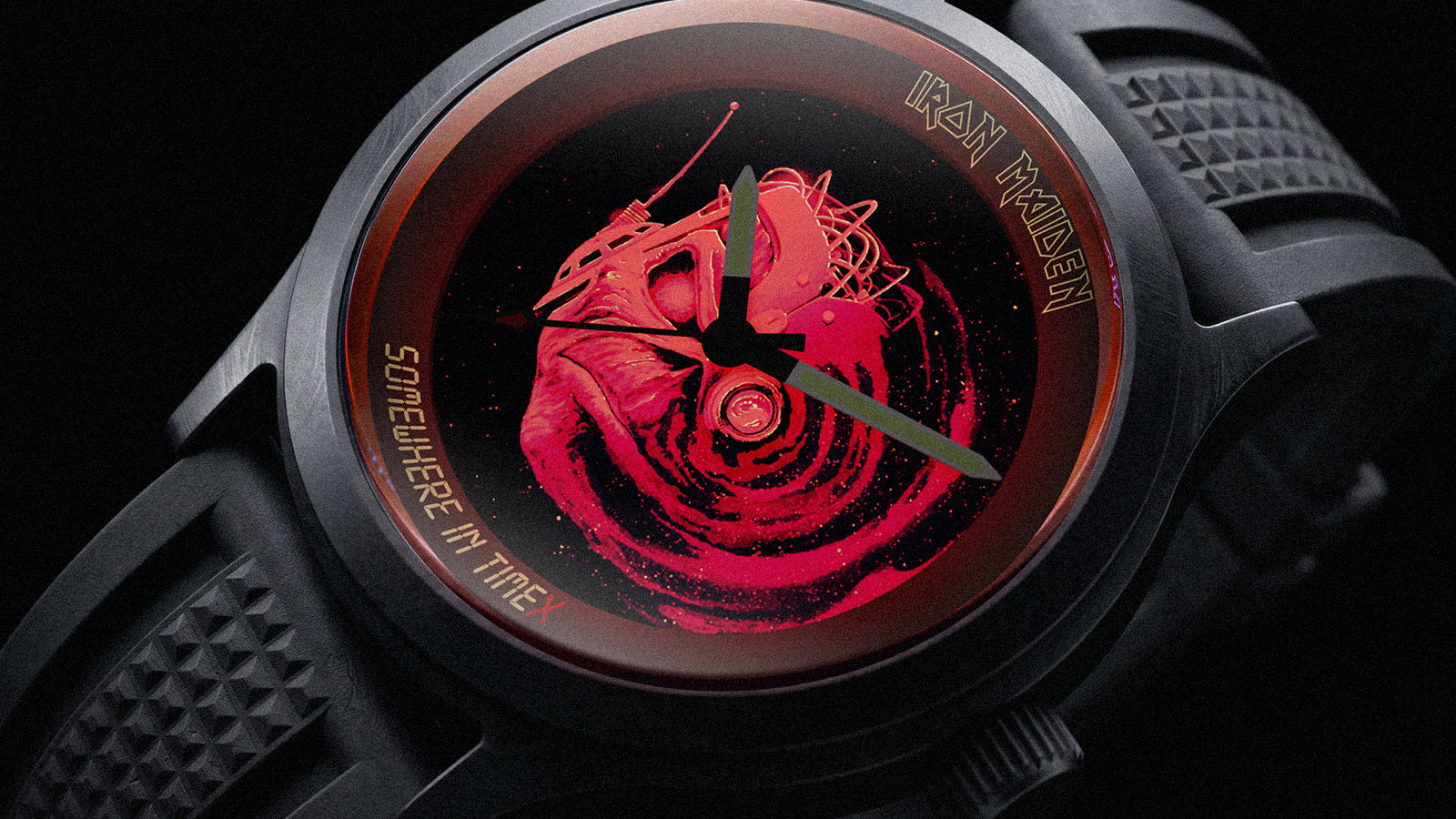 Macro close-up of the Timex x Iron Maiden watch face featuring Eddie artwork in vivid red tones with “Somewhere in Time” and Iron Maiden branding around the dial.