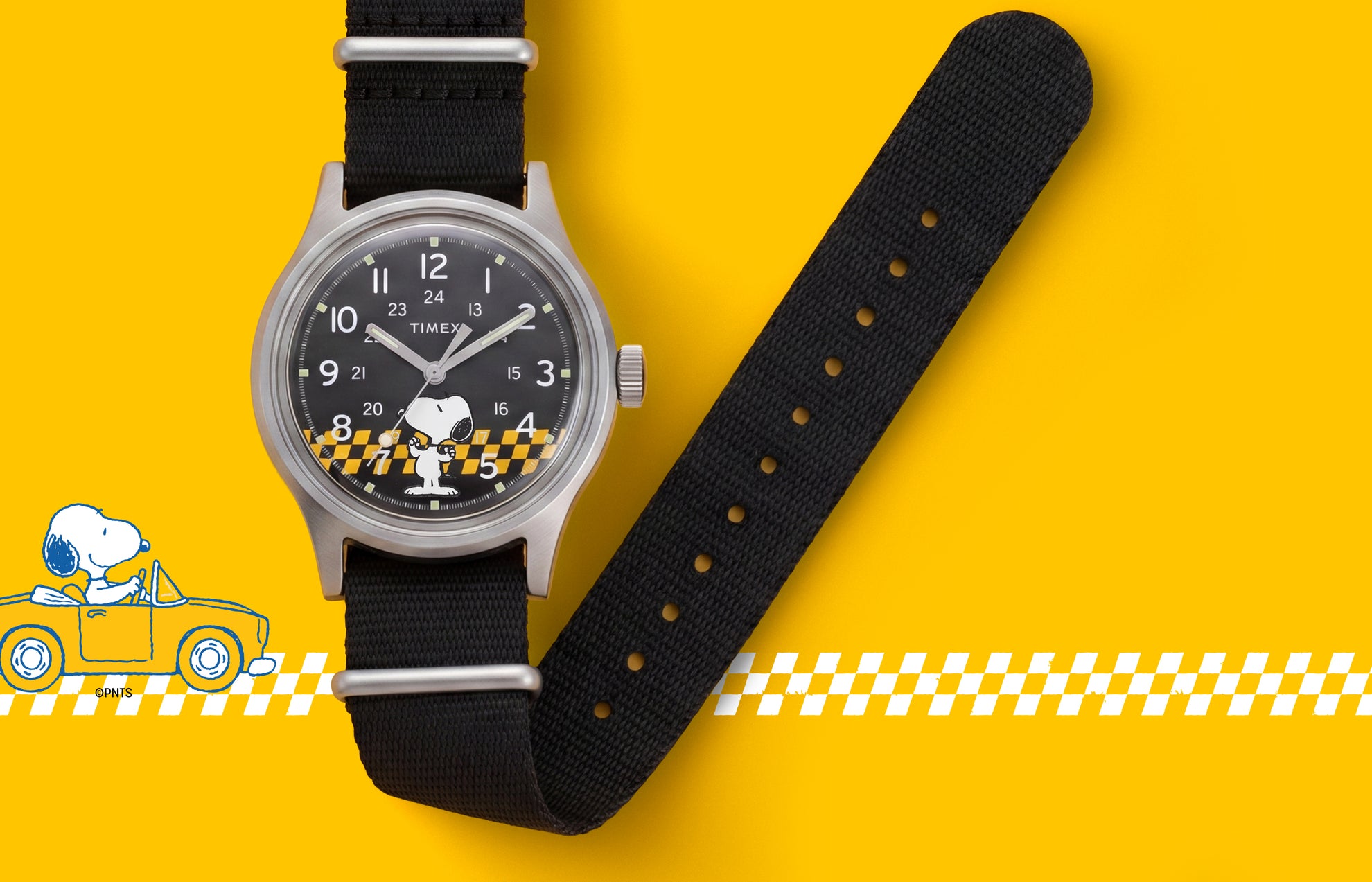 Peanuts® x Timex MK1® watch with a black fabric strap, black dial featuring Snoopy in sunglasses, and a yellow racing-inspired background with checkered graphics.
