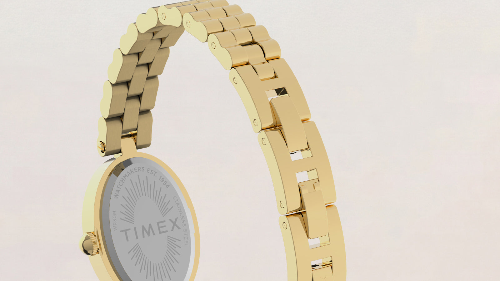 Close-up of the Timex Cavatina® Luxe gold-tone stainless steel bracelet showing the jewelry-style clasp and polished links.