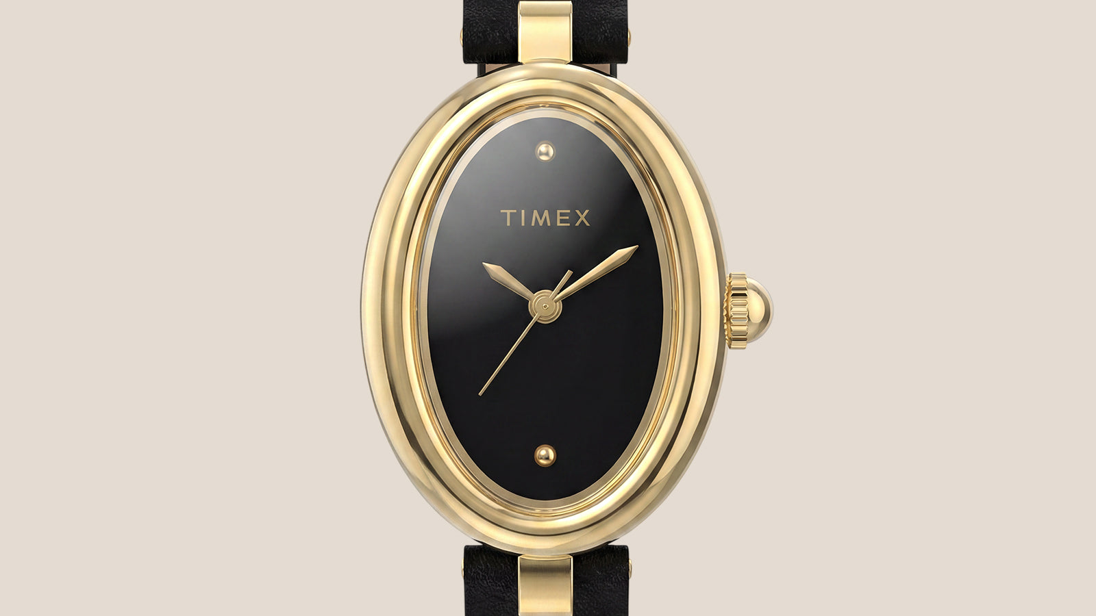 Vista frontal del Timex Cavatina® Luxe, con una caja ovalada pulida en tono dorado, esfera negra brillante, agujas minimalistas en tono dorado y correa de piel negra.