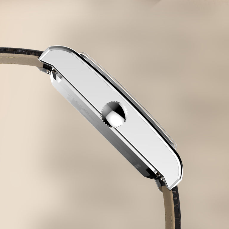 Side profile of the Timex 1976 Lexington Reissue Inspired watch highlighting its slim rectangular stainless steel case and crown.