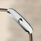 Side profile of the Timex 1976 Lexington Reissue Inspired watch highlighting its slim rectangular stainless steel case and crown.