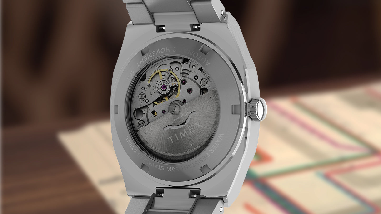 Rear view of the Timex Automatic E Line 38mm, highlighting the exhibition case back and automatic movement.
