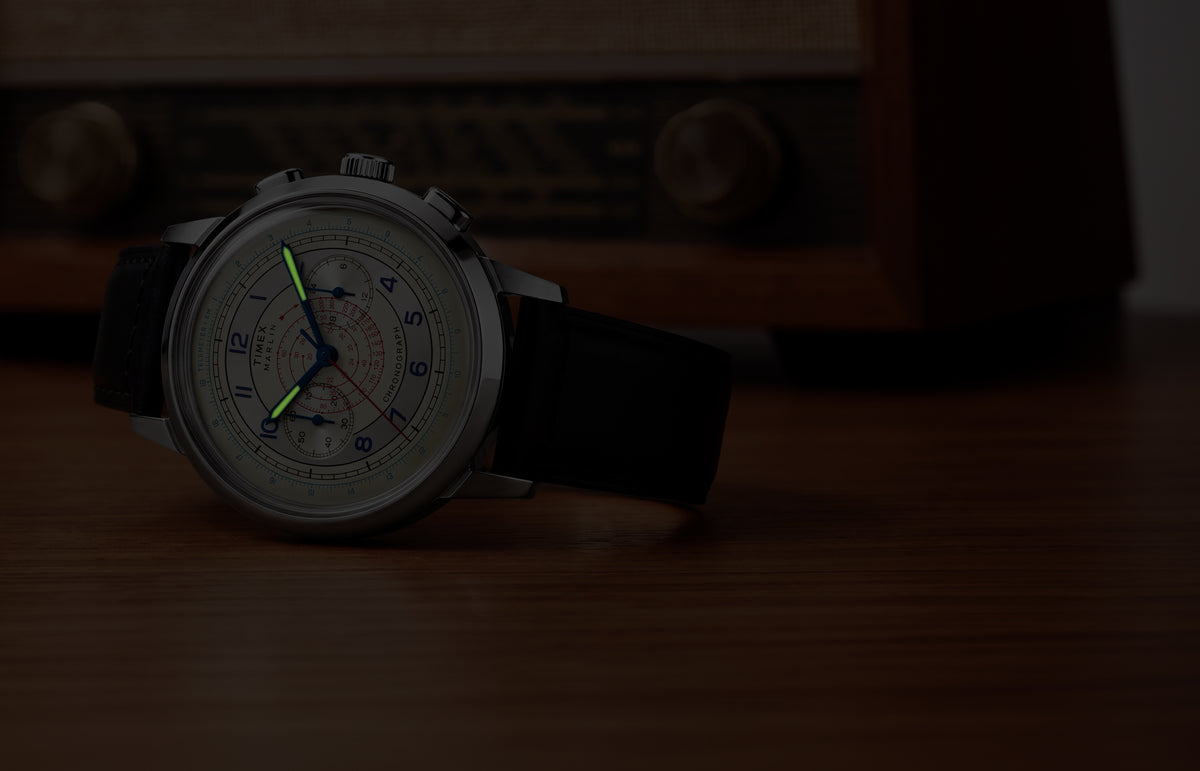 Marlin® Neo Classic Chronograph in low light with green luminous hour and minute hands.