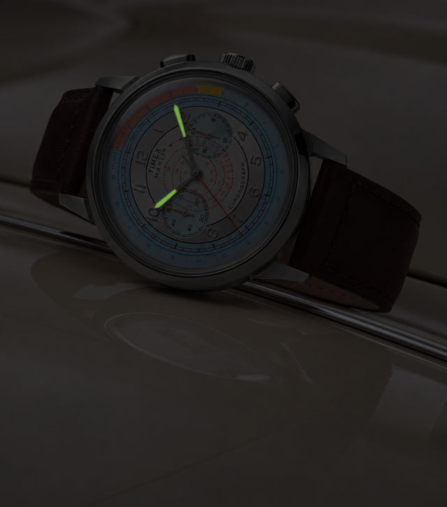 Marlin® Neo Classic Chronograph in low light with green luminous hour and minute hands.