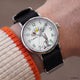 TW2Y99100 Looney Tunes Bugs and Friends x Timex Standard watch worn on a wrist, showing its white character dial, silver-tone case, and black fabric strap.