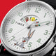 TW2Y99100 Detailed view of the white dial featuring Bugs Bunny below the hands and Taz, Tweety, and Sylvester in a curved character display above.