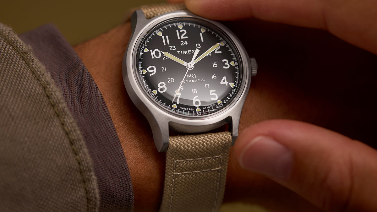 Close-up of the MK1® Automatic watch worn on the wrist.