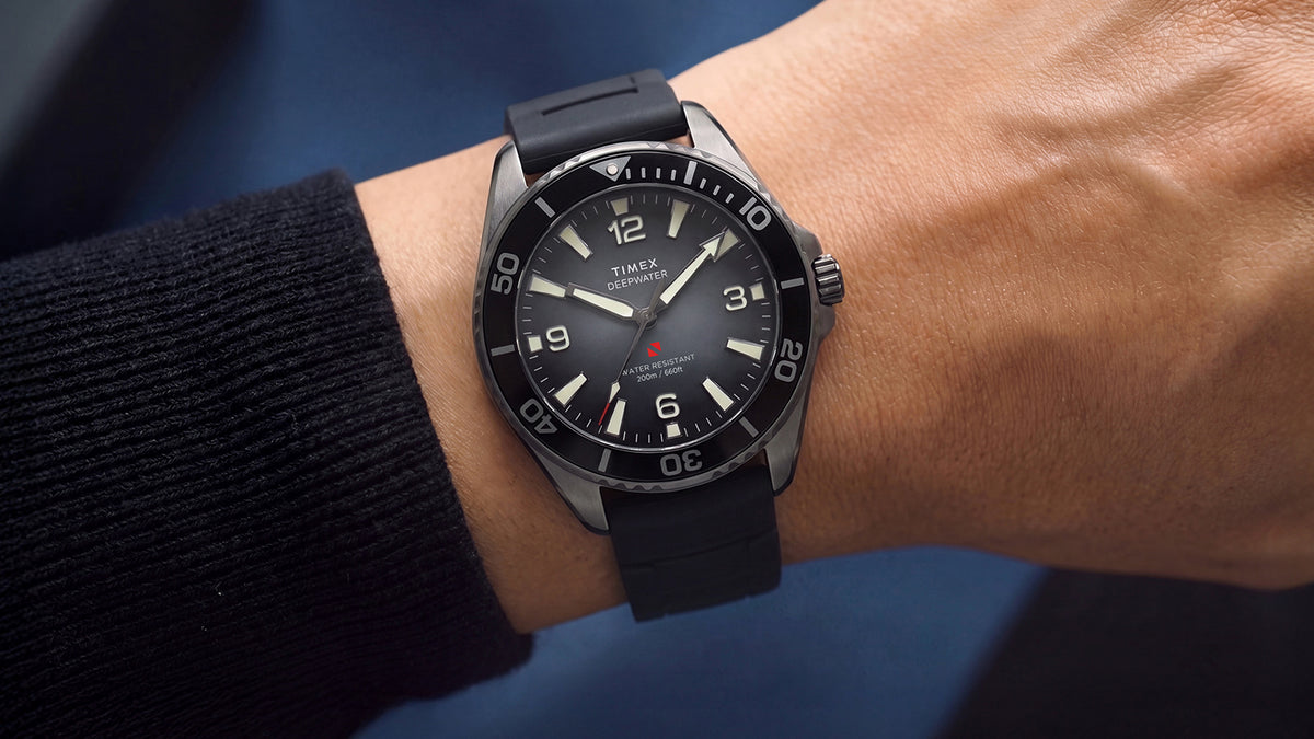 TW3A02000 Gray-dial Deepwater Arctic 200 watch with a black strap worn on the wrist.